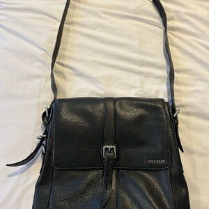 Cole Haan 100% leather messenger bag with long strap.